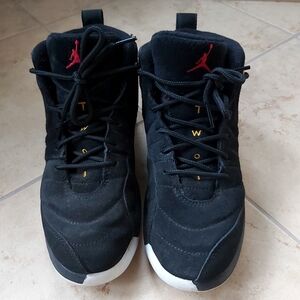 Air Jordan 12 Retro Reverse Taxi High Black Sneakers
